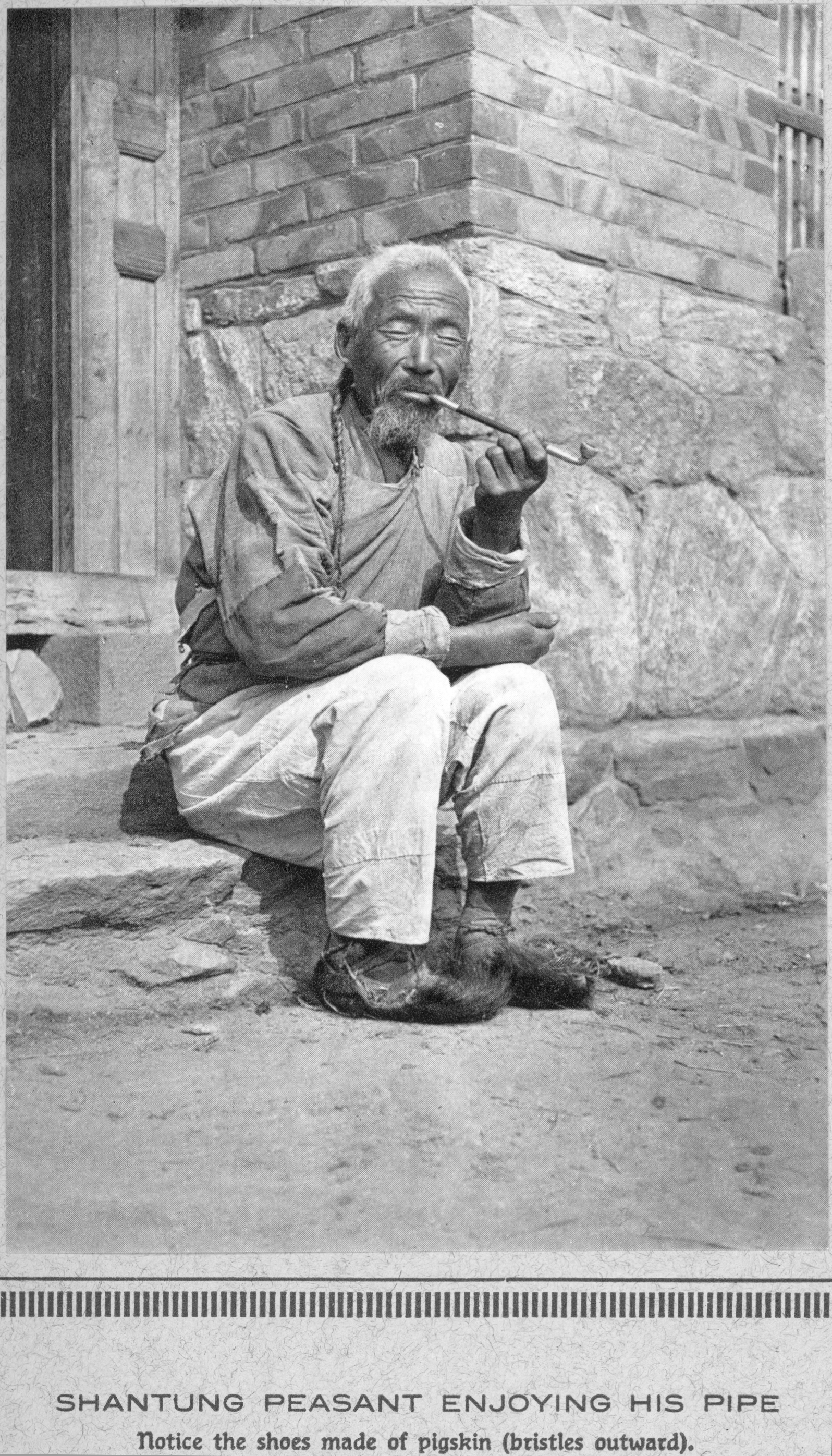 Shantung peasant enjoying his pipe