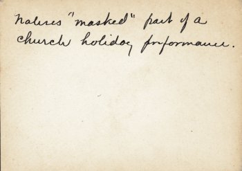 Back of photo: Natives 'masked' part of a church holiday performance