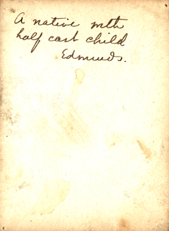 Back of photo: A native with half cast child